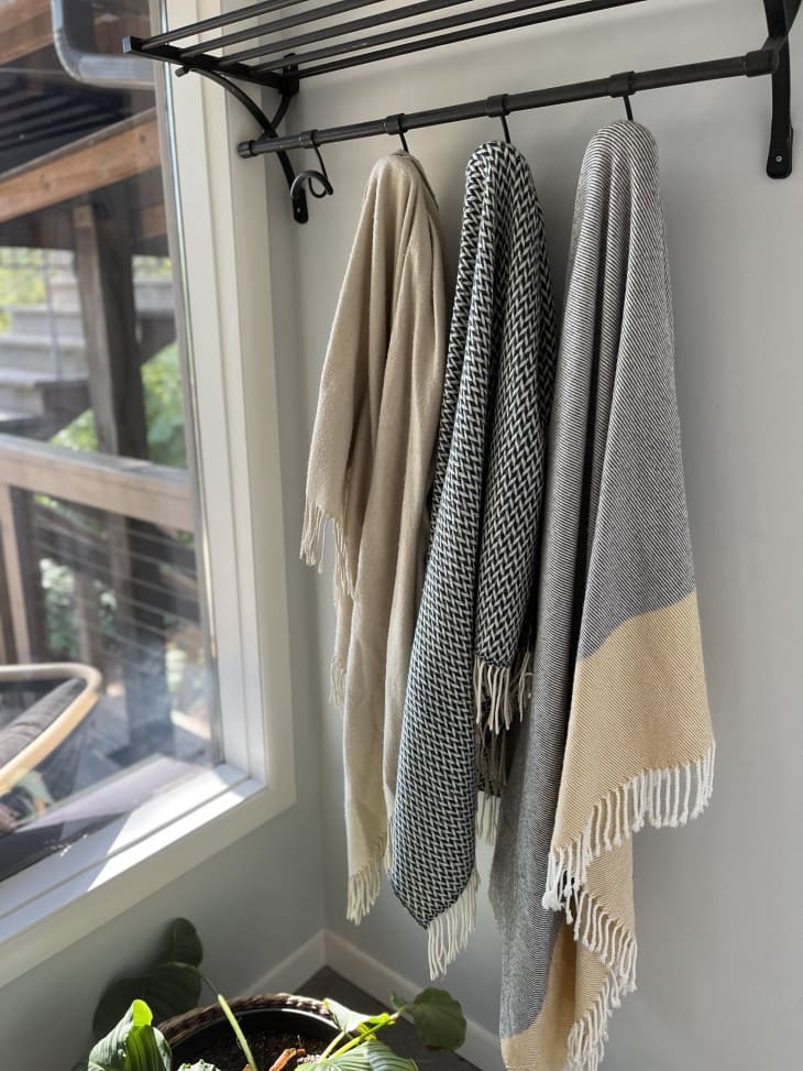 I Tried Storing My Blankets on a Blanket Wall Apartment Therapy